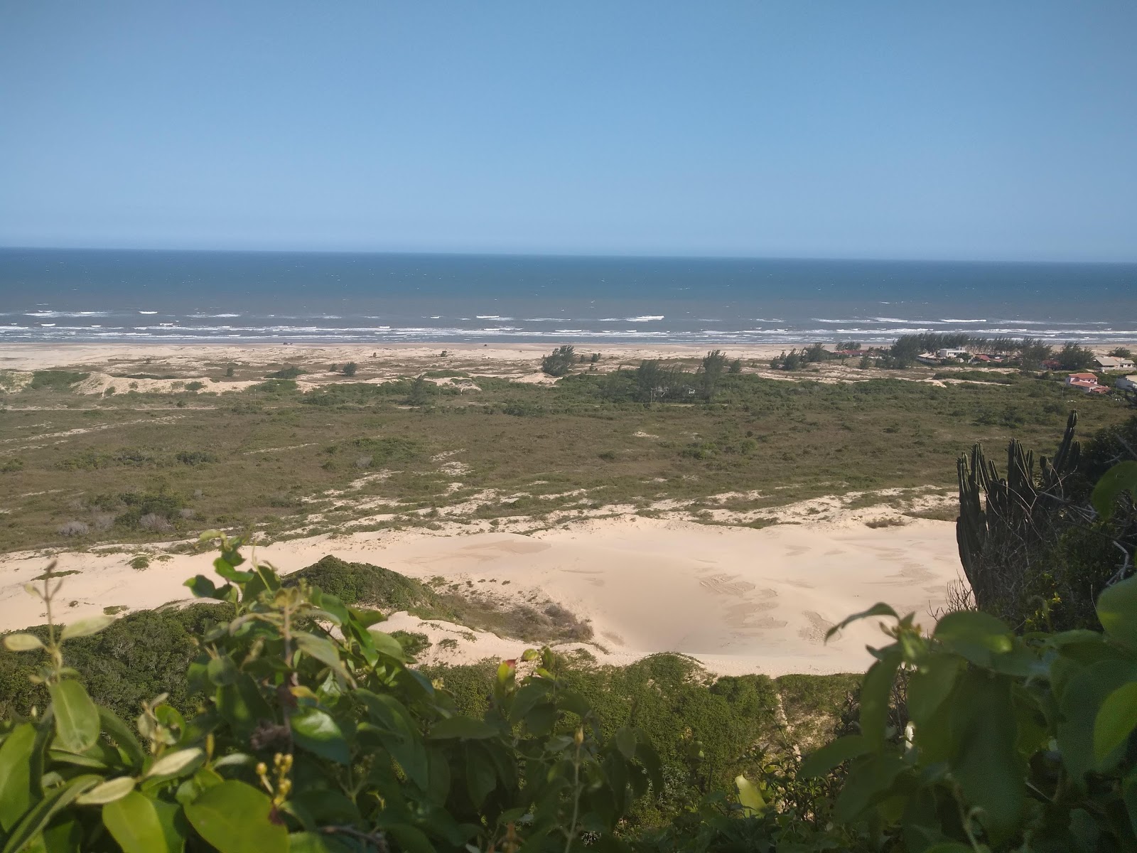 Foto van Praia de Arroio do Silva met recht en lang