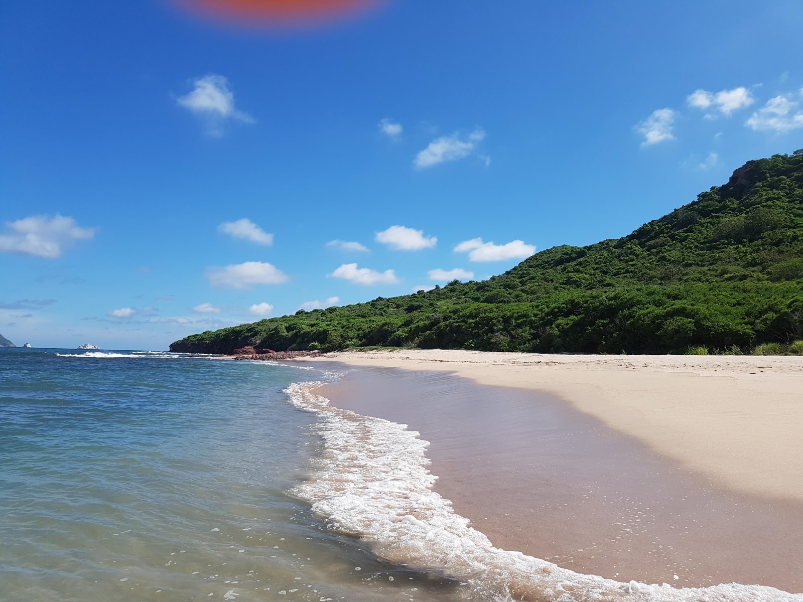 Fotografie cu Venados beach cu o suprafață de nisip beige fin