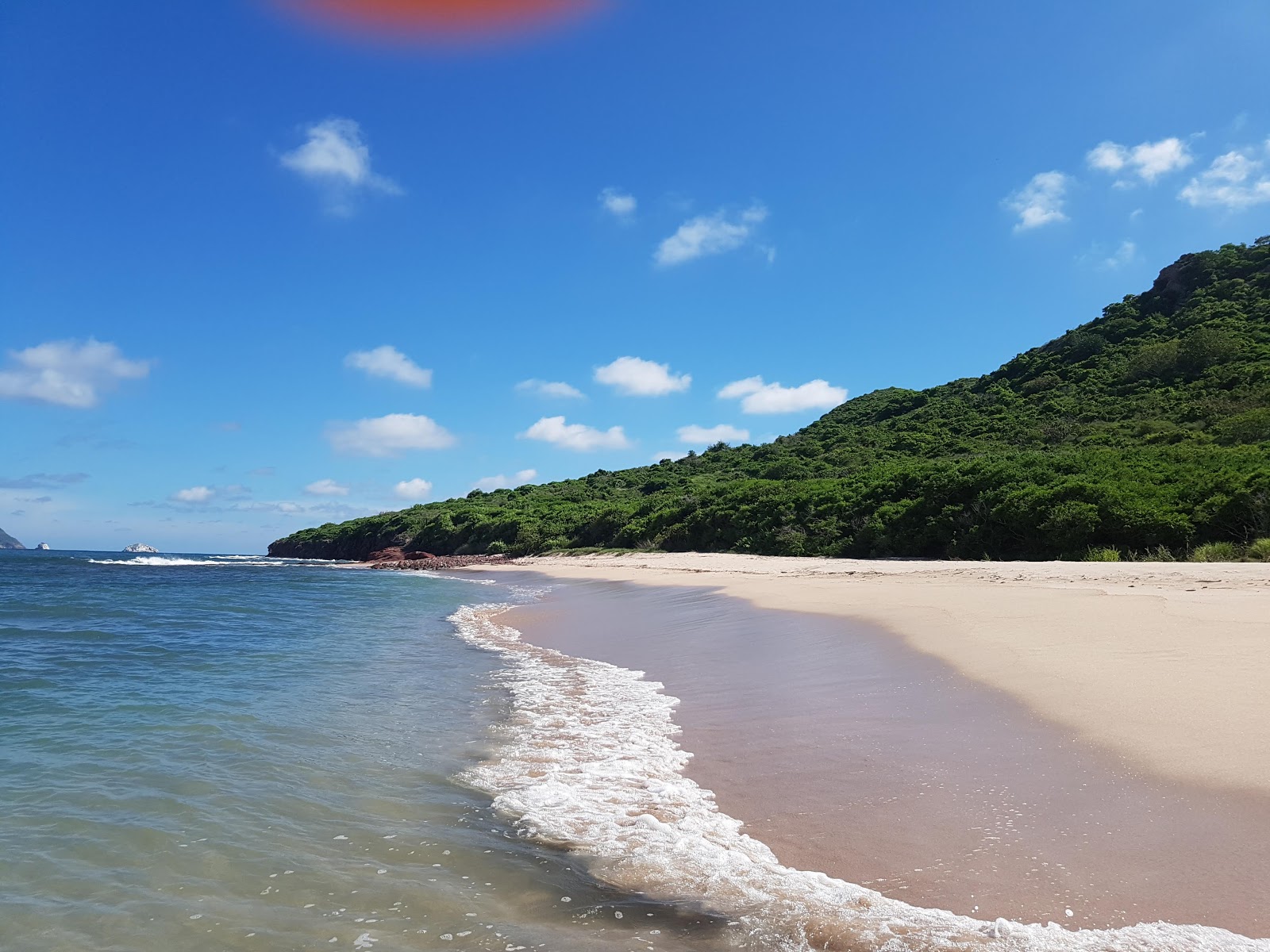 Foto av Venados beach med ljus fin sand yta