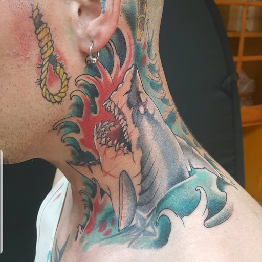 Explore tiger shark tattoo ideas, creative tattoo ideas in Abington, available at Tattoo Galaxy (Abington) Piercing and Custom Tattoos