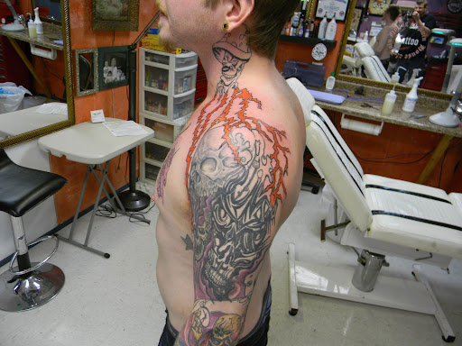 Explore temple tattoo ideas, creative tattoo ideas in Rockford, available at House Of Pain Tattoo co.