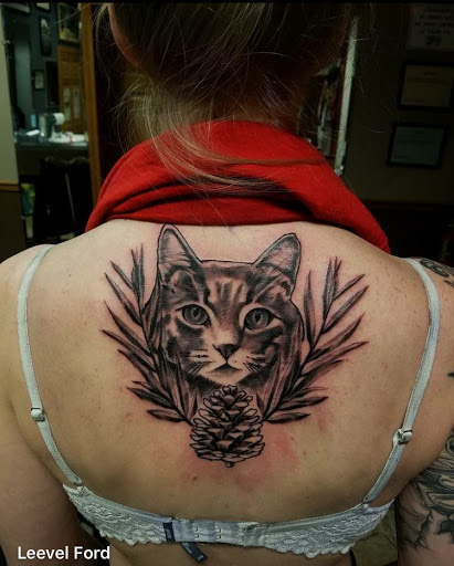 Explore cover tattoo ideas, creative tattoo ideas in Stevens Point, available at Black Rabbit Tattooing