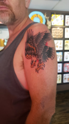 Tattoo Shop «Define Tattoos», reviews and photos, 165 E Aurora Rd, Northfield, OH 44067, USA