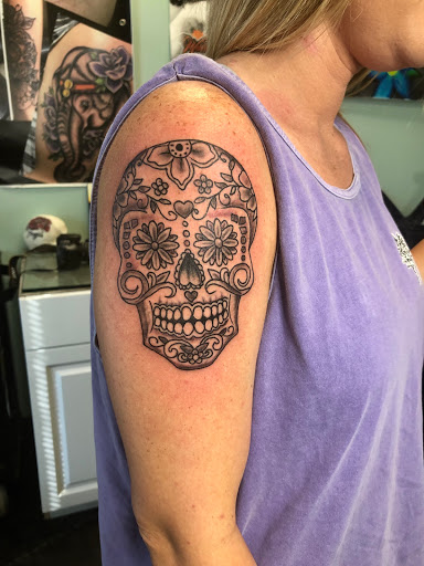 Explore tattoo ideas for men about family, creative tattoo ideas in Meridian, available at Creative Pain Tattoo Studio
