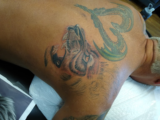 Explore palm size tattoos ideas, creative tattoo ideas in Garden City, available at Talon Tattoo Co