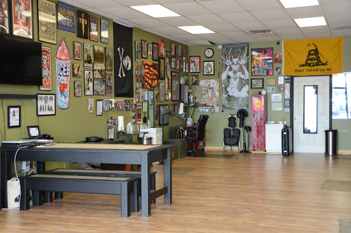 Tattoo Shop «Tattoo Machine Gun- Clark», reviews and photos, 1705 Charlestown New Albany Rd a, Jeffersonville, IN 47130, USA