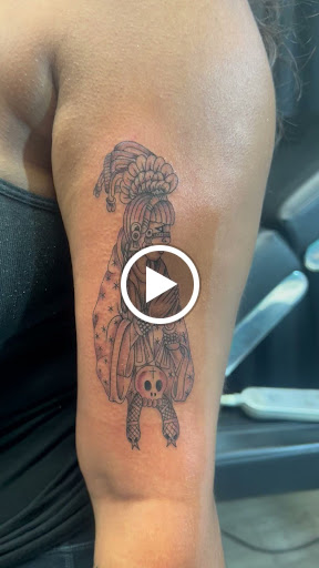 Explore we the people tattoo ideas, creative tattoo ideas in Garden Grove, available at Ashes 2 Ink Tattoo and Piercing LLC