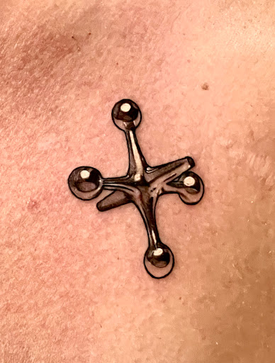 Explore ghost band tattoo ideas, creative tattoo ideas in Mesa, available at Club Tattoo