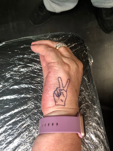 Explore dainty finger tattoo ideas, creative tattoo ideas in Meridian, available at Creative Pain Tattoo Studio