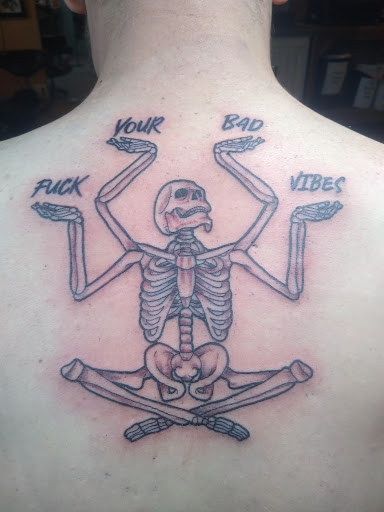 Explore one piece tattoos ideas, creative tattoo ideas in Duluth, available at Benchmark Tattoo