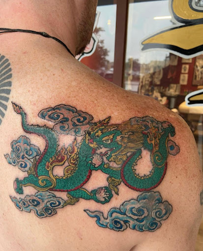 Explore hang loose tattoo ideas, creative tattoo ideas in Boulder, available at Claw and Talon Tattoo