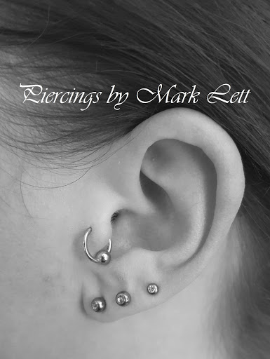 Explore front thigh tattoo ideas, creative tattoo ideas in Saint Petersburg, available at Edens Apple Tattoos and Piercings