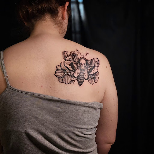 Find wristband tattoo ideas for your next unique tattoo in Minocqua at Whisky Rose Tattoo Parlor