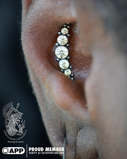 Explore dog paw print tattoo ideas, creative tattoo ideas in Pompano Beach, available at Athena Body Adornment