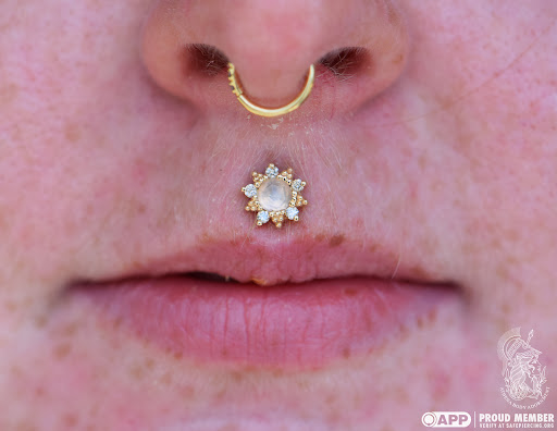 Explore sickle cell tattoo ideas, creative tattoo ideas in Pompano Beach, available at Athena Body Adornment