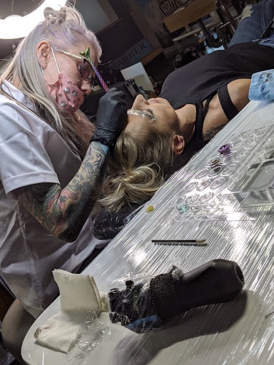 Explore tattoo ideas for men's shoulders, creative tattoo ideas in Longmont, available at Sharkys Paradise