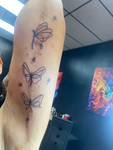 Explore marvel leg tattoo ideas, creative tattoo ideas in Lake City, available at Crooked Spines Tattoo Studio