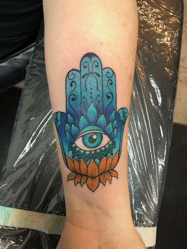 Explore honeysuckle tattoo ideas, creative tattoo ideas in Nashua, available at Mayhem Ink Tattoo