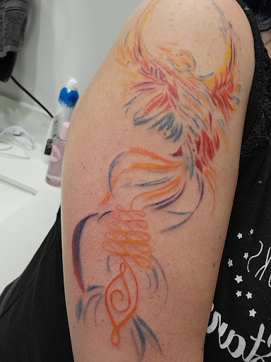 Explore meaningful elegant spine tattoo ideas, creative tattoo ideas in Murfreesboro, available at Absolute Ink Tattoo & Piercing