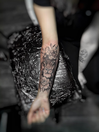 Explore street signs tattoo ideas, creative tattoo ideas in Lavonia, available at 1890 Tattoo Co.