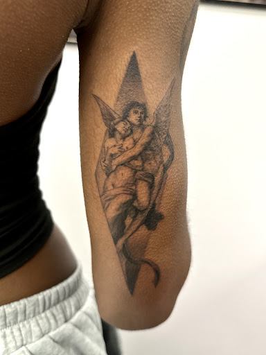 Explore inner bicep tattoo ideas for men, creative tattoo ideas in Anaheim, available at Autumn Moon Tattoo