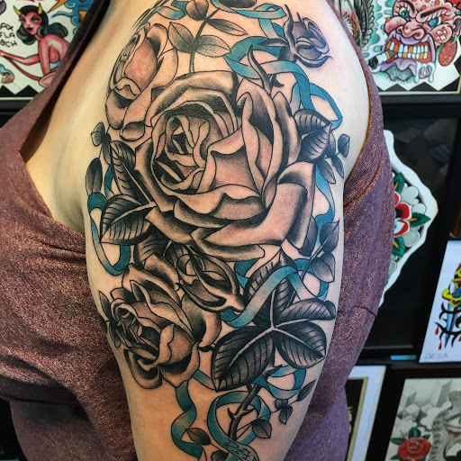 Explore tattoo ideas for book lovers, creative tattoo ideas in Reno, available at Evolution Tattoo