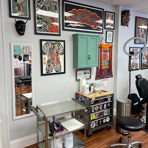 Explore lower belly tattoo ideas, creative tattoo ideas in Metuchen, available at Classic Tattoo Club Metuchen