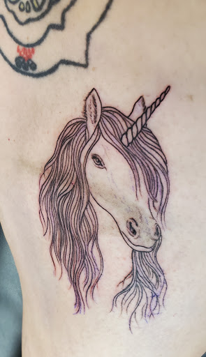 Explore simple neck tattoo ideas, creative tattoo ideas in Columbia, available at -Born Again Tattoo- New Tattoos, Cover-Ups, Repairs, & Restorations Made Daily
