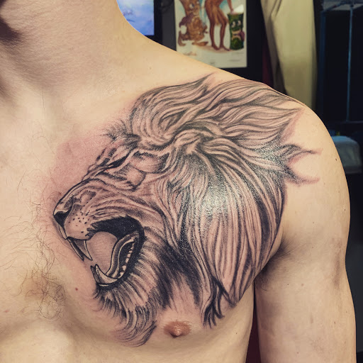 Find tattoo ideas of roses for your next unique tattoo in Dover at Walls of Wonder Tattoo And Body Piercing