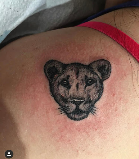 Explore charizard tattoo ideas, creative tattoo ideas in Kansas City, available at Grimm Tattoo and Bert Grimm Museum