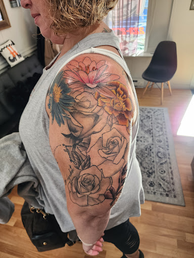 Explore tattoo cover up ideas on leg, creative tattoo ideas in Palmyra, available at A Piece of Perfection Tattoo