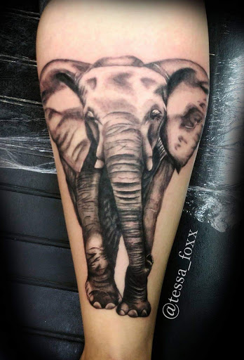 Explore tattoo ideas for dogs who passed, creative tattoo ideas in Chattanooga, available at Inked Expressions North Tattoos