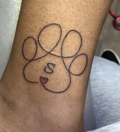 Explore last name back tattoo ideas, creative tattoo ideas in Chattanooga, available at Chattanooga Tattoo Company