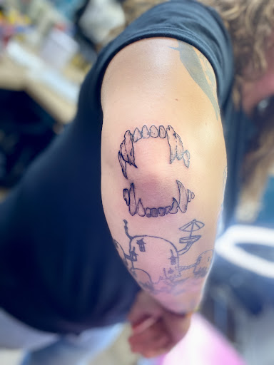 Explore hair tattoo ideas, creative tattoo ideas in Lake City, available at Crooked Spines Tattoo Studio