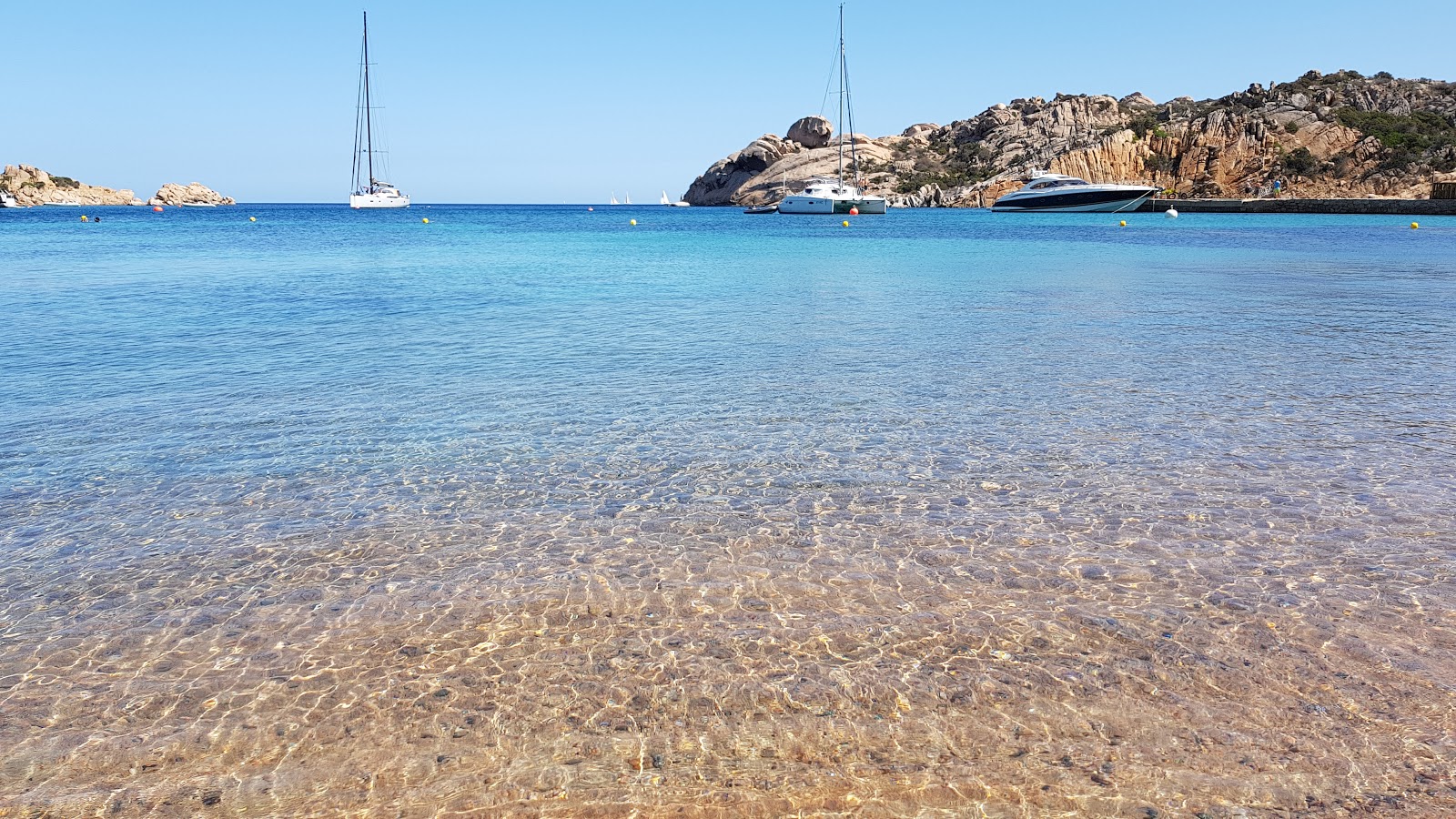 Photo of Cala Spalmatore with turquoise pure water surface
