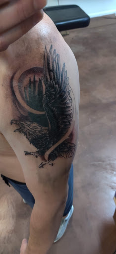 Explore rib cage tattoo ideas for guys, creative tattoo ideas in Glendale, available at Chosen Art Tattoo