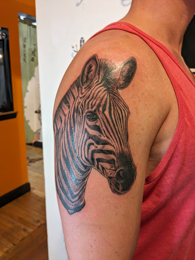 Explore july birthday tattoo ideas, creative tattoo ideas in Jamaica Plain, available at Fat Rams Pumpkin Tattoo