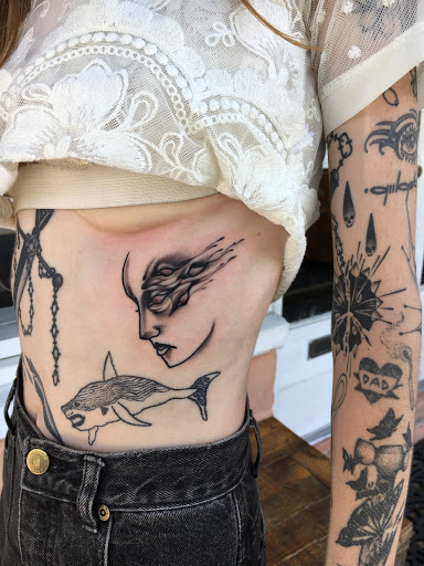 Explore tattoo ideas for females on hips, creative tattoo ideas in Savannah, available at Riverside Tattoo Parlor