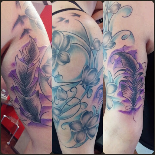 Explore beautiful flower tattoo ideas, creative tattoo ideas in Quincy, available at Threshold Of Pain Tattoo Shop