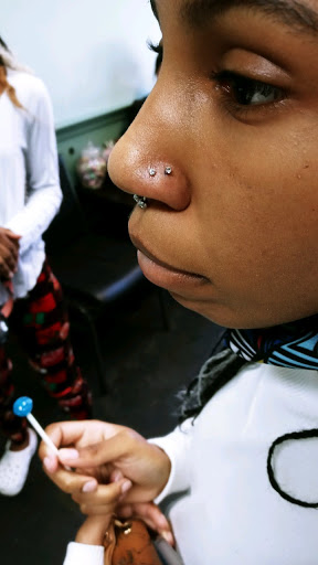 Explore street sign tattoo ideas, creative tattoo ideas in Meridian, available at Creative Pain Tattoo Studio