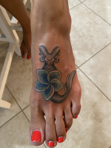 Explore tattoo ideas for ladies feet, creative tattoo ideas in Fort Myers, available at Laid Back Tattoo