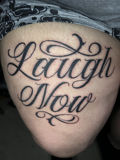 Explore tattoo cover up ideas for ring finger, creative tattoo ideas in Orange, available at Top Floor Tattoo Studio