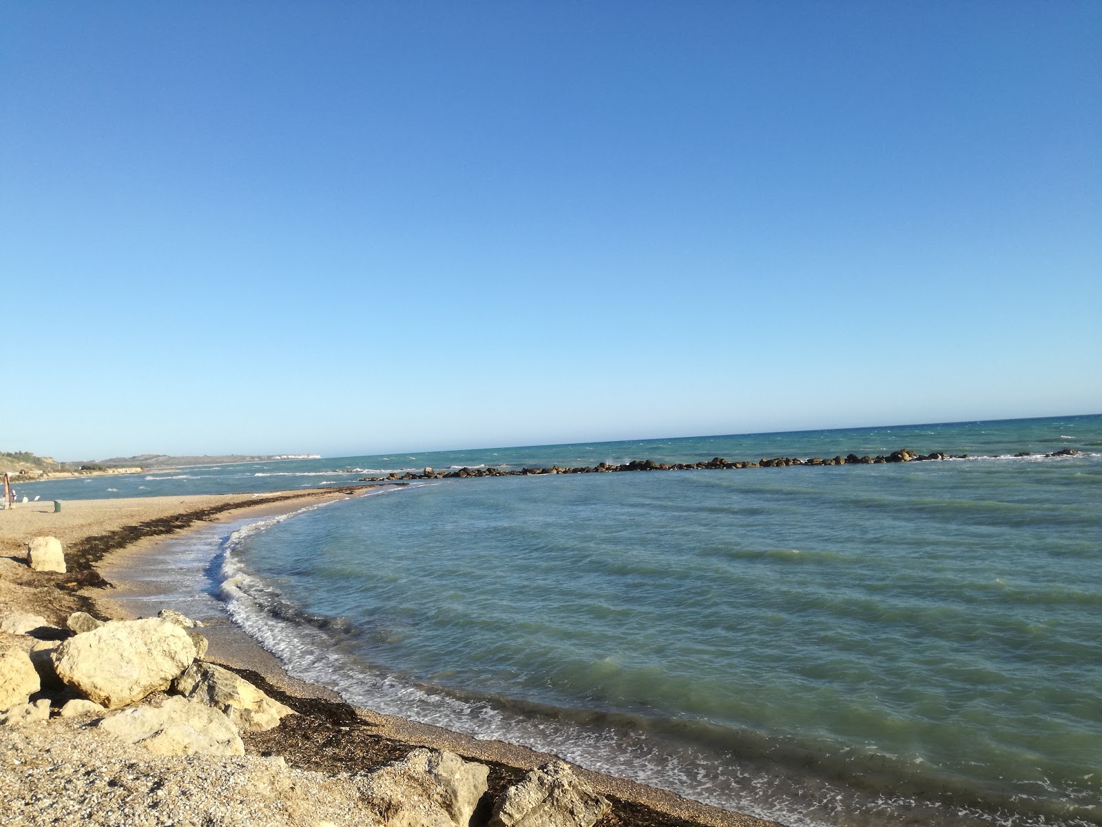 Foto von Seccagrande Beach - guter haustierfreundlicher Ort für den Urlaub