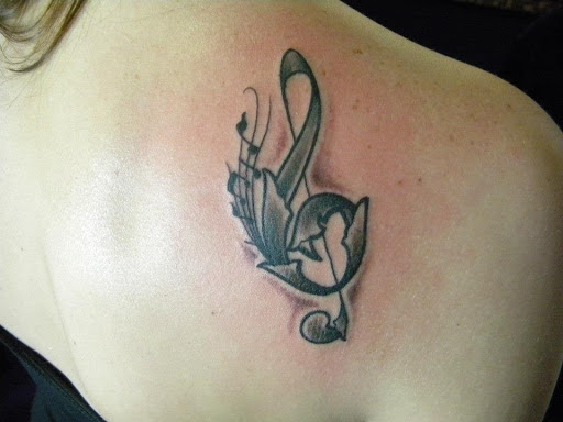 Tattoo Shop «Magnum Tattooing», reviews and photos, 2317 Division Ave S, Grand Rapids, MI 49507, USA