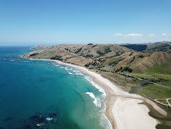 Pouawa Beach'in fotoğrafı düz ve uzun ile birlikte