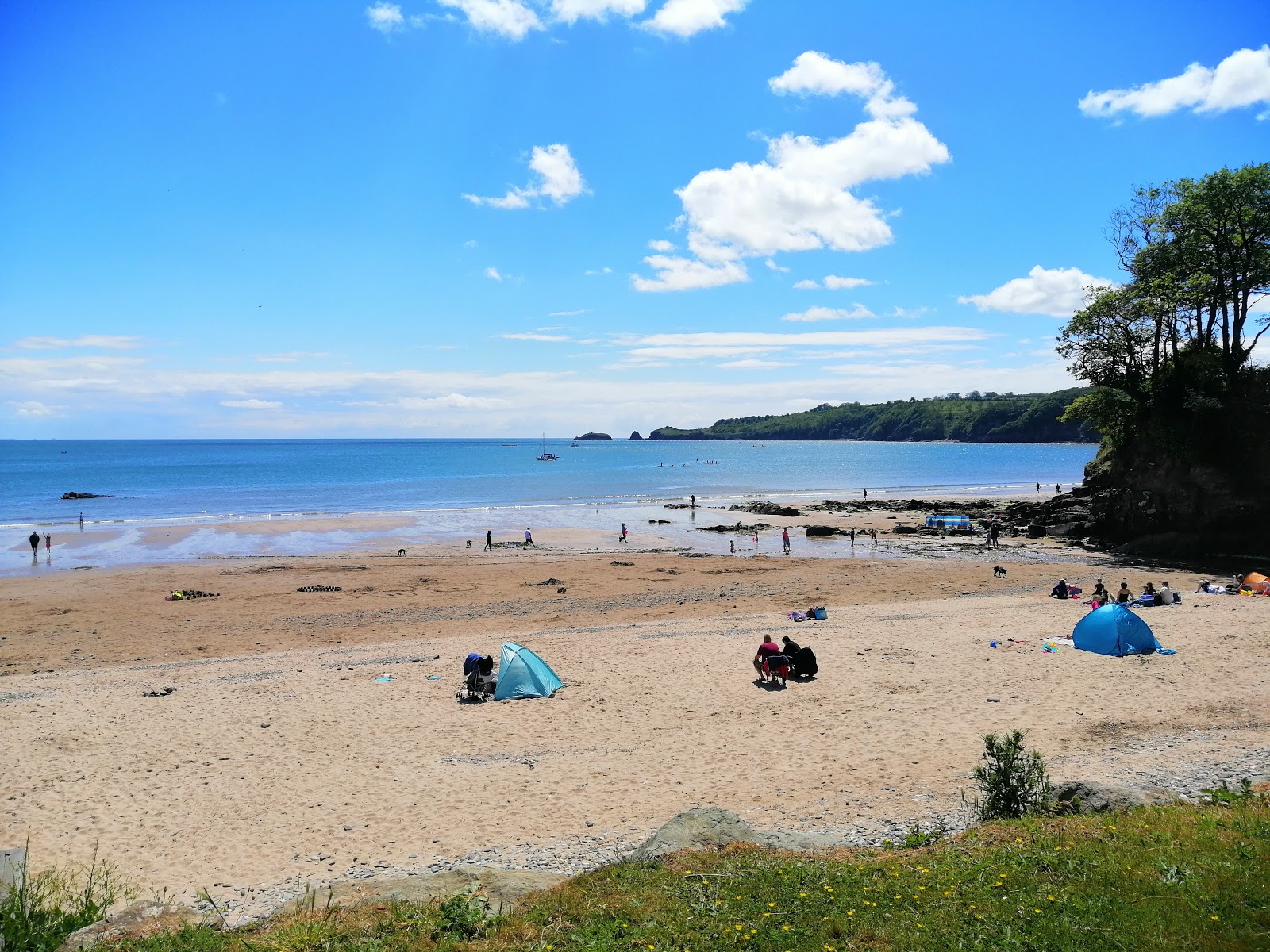 Photo of Coppet Hall beach with blue pure water surface