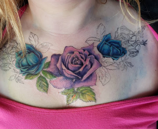 Explore cute cover up tattoo ideas, creative tattoo ideas in North Bend, available at The Rusty Needle Tattoo Parlor