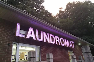 Suds Your Duds Laundromat image