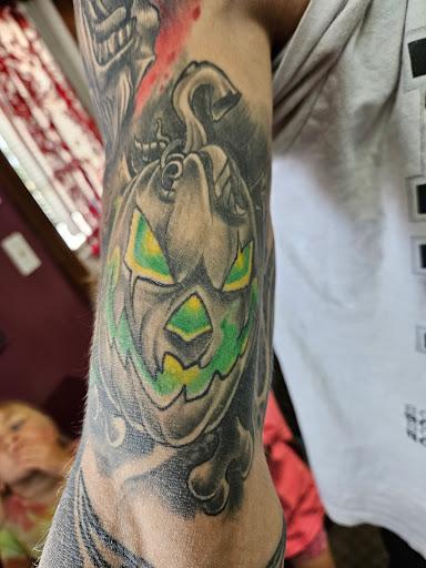 Explore honey badger tattoo ideas, creative tattoo ideas in Angola, available at Hoodlum Ink