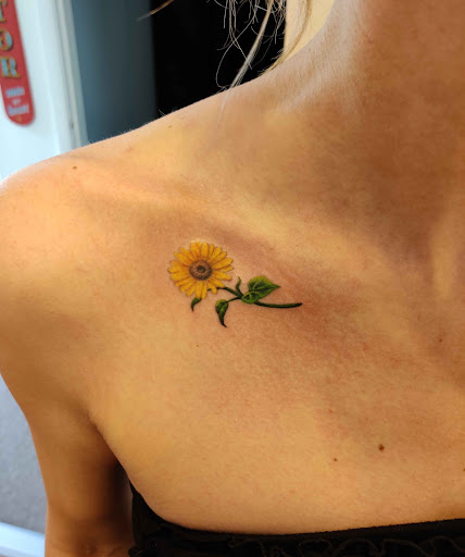 Explore lily tattoo ideas, creative tattoo ideas in Hebron, available at Explosive Ink Tattoo